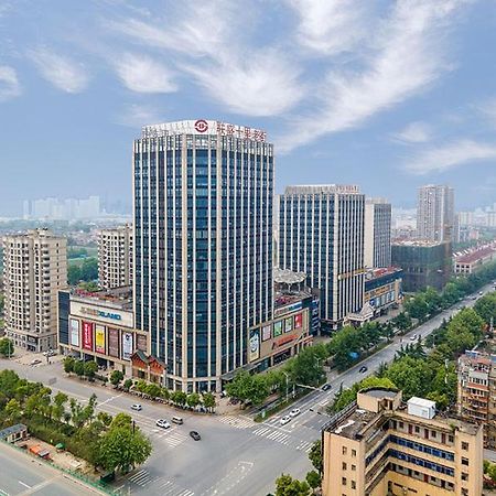 Vienna International Hotel Jiujiang Shili Street Exterior photo
