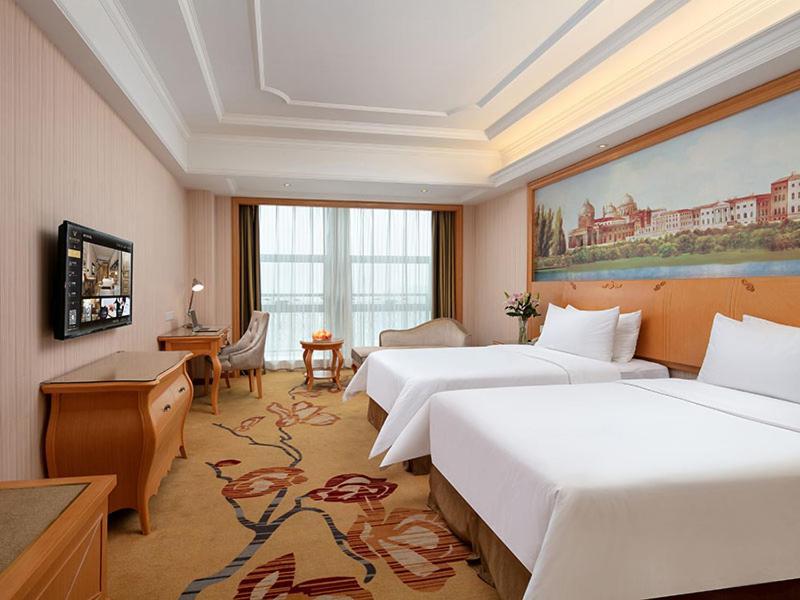 Vienna International Hotel Jiujiang Shili Street Exterior photo