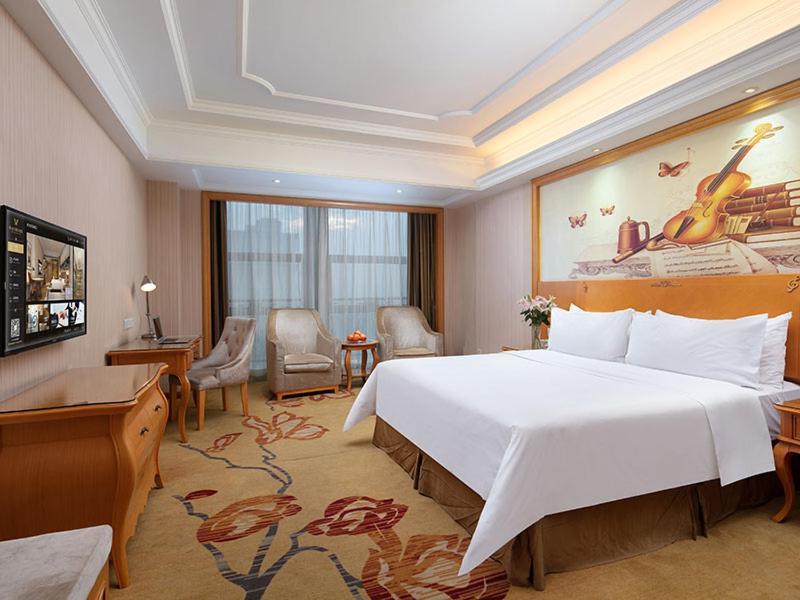 Vienna International Hotel Jiujiang Shili Street Exterior photo