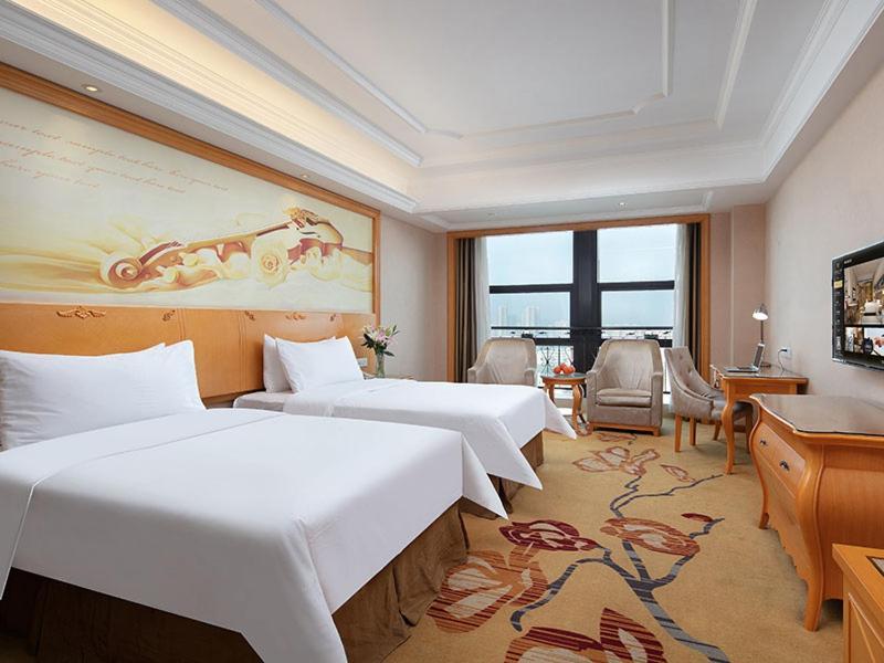 Vienna International Hotel Jiujiang Shili Street Exterior photo