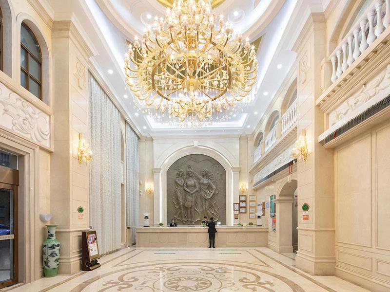 Vienna International Hotel Jiujiang Shili Street Exterior photo