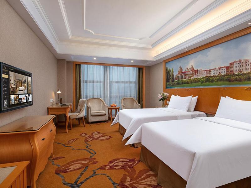 Vienna International Hotel Jiujiang Shili Street Exterior photo