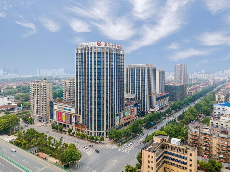 Vienna International Hotel Jiujiang Shili Street Exterior photo